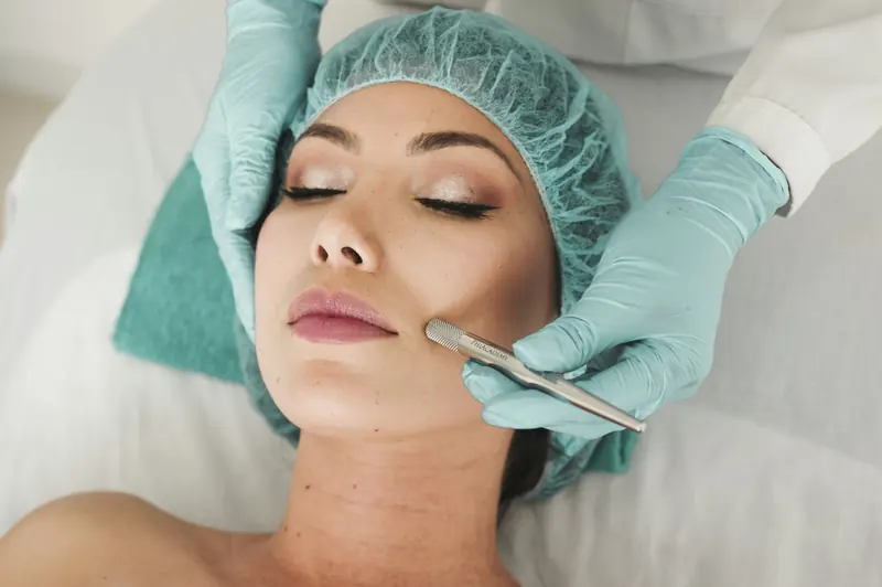 Clinician performing a skin treatment